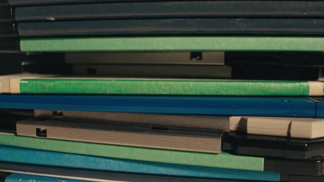 Floppy disk many retro close up macro vintage diskette computer data storage collection stack detail