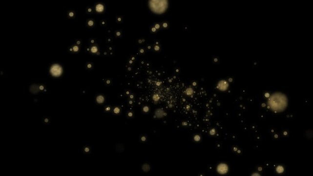 Golden bokeh dust particles floating smoothly in dark space for luxury background