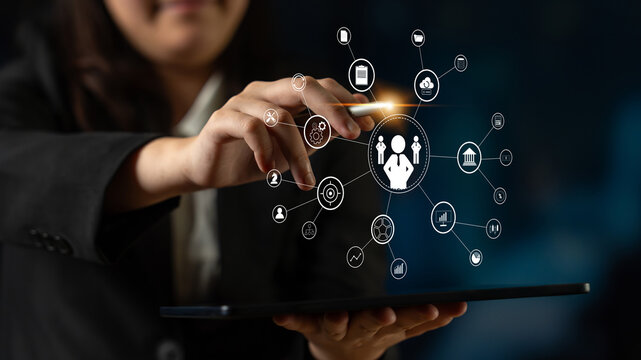 A concept of centralized business management and corporate strategy. A leadership team connecting to all functions like finance, operations, and planning. Motif