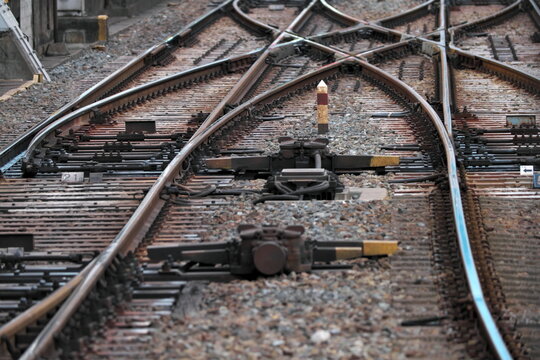 Railway tracks converging and diverging at a switch junction