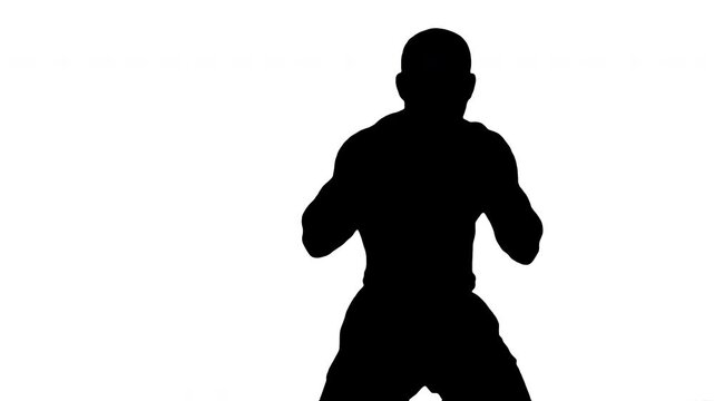 Black silhouette of boxer man on white background. Black and white medium shot of a sport concept. Alpha matte and isolated.