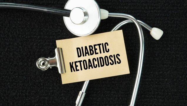 Stethoscope and paper with the word Diabetic ketoacidosis DKD or DKA is a life-threatening emergency caused by a severe lack of insulin, which forces the body to burn fat for energy and release toxic 