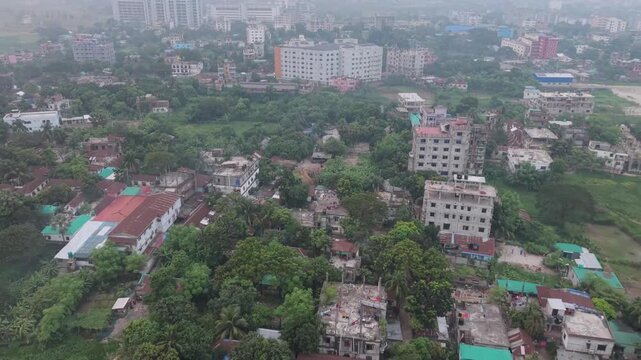 Aerial View of Green Residential Cityscape with Dense Buildings