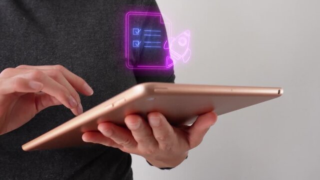 Plan verification and execution. Close-up of a businesswoman interacting with her tablet, featuring a virtual icon of a document with a checklist and a rocket.
