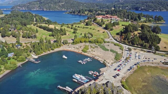 Aerial 4K drone view of a marina with boats on Nahuel Huapi Lake, Bariloche, Patagonia Argentina