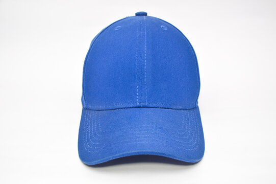 Blank blue cap front view isolated on white background. Empty plain cotton sport hat apparel accessory.