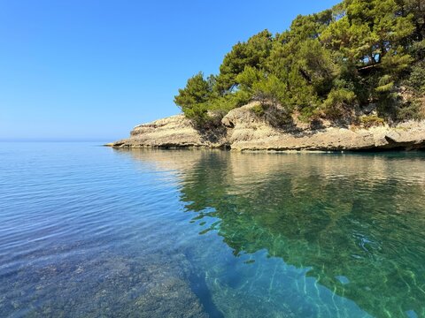 Crystal-clear waters of the Adriatic Sea in a pristine bay.