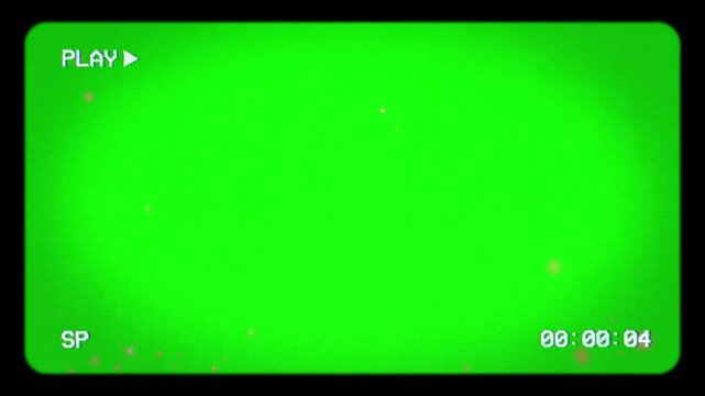 Camcorder interface with green screen shows play icon and timestamp.