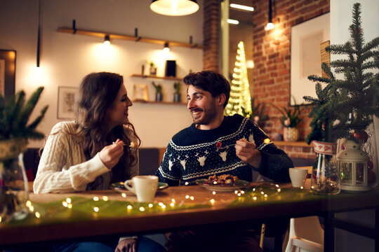 Couple on date in cafe during Christmas time