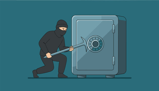Dangerous thief in black mask and outfit trying to pry open a heavy security steel safe using a crowbar.