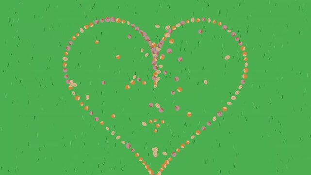 Animated heart shape formed by floating particles on a green background