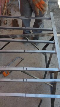 Measurement Markings on Iron Bar Frame for Cutting