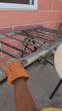 Hacksaw Placed on Iron Profile After Completing Cut