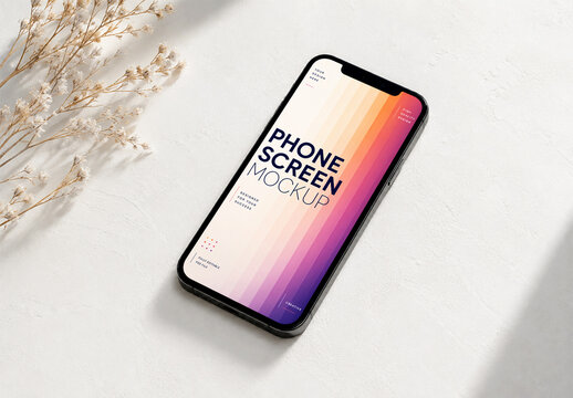Smartphone Screen Mockup on White Textured Surface with Dried Flowers
