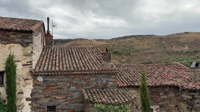 Patones traditional black slate houses in patones de arriba, spain