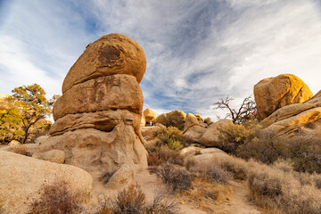 Granite Boulder Formation Beneath a Cloudy Desert Sky © J Westermann-Blawert