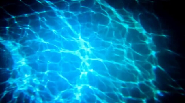 Rippling underwater caustics light patterns in blue seamless loop