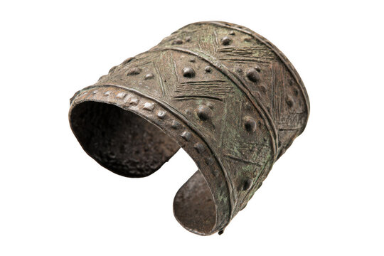 Ancient bronze cuff bracelet with hammered geometric patterns