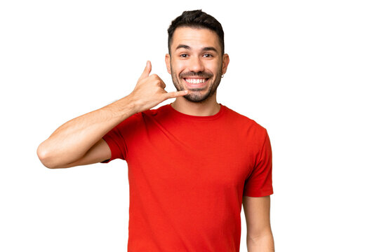 Young handsome caucasian man over isolated chroma key background making phone gesture. Call me back sign