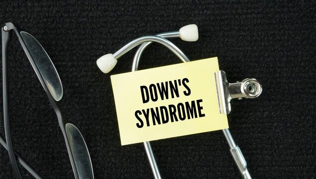Stethoscope and stick with the word Down syndrome is a genetic condition caused by an extra copy of chromosome 21 that alters how the brain and body develop