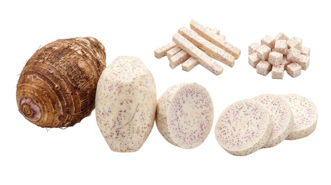  The image showcases a variety of taro preparations, featuring a whole taro root on the left, along with sliced, cubed, and stick-shaped pieces of taro on a black background, highlighting its versatil