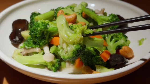 Chopsticks Lifting Broccoli Vegetable Qingdao Chinese Seasonal Greens