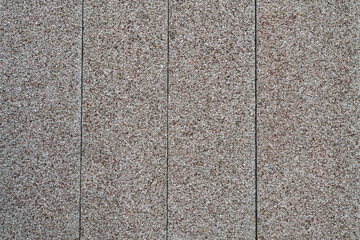 Exposed aggregate concrete wall panels with rough pebble texture © Jane Allan