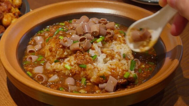 Chinese Sea Intestine Rice Bowl Spoon Lifting Steaming Hot Portion Qingdao