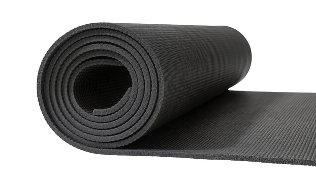 Rolled black textured yoga mat partially unrolled, isolated on transparent background