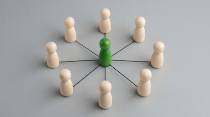 Obraz premium Green wooden figure connects with beige pieces using black lines indicating network management and teamwork corporate structure.
