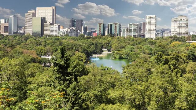 Mexico City, Chapultepec, view of the lake, buildings in the distance, cloudy sky, time-lapse