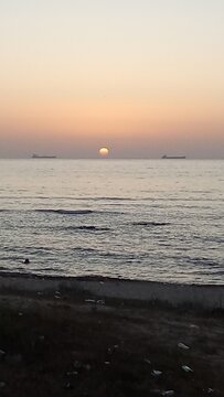 sunset over the Atlantic Ocean at Douar El Ghadban beach Morocco 