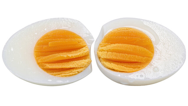 Two halves of a hard-boiled egg showing cooked white and yellow yolk, isolated on transparent background