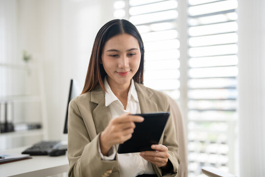 Businesswoman working with digital tablet. modern technology.