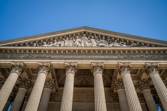 Low-angle view of the &Eacute;glise de la Madeleine pediment and.