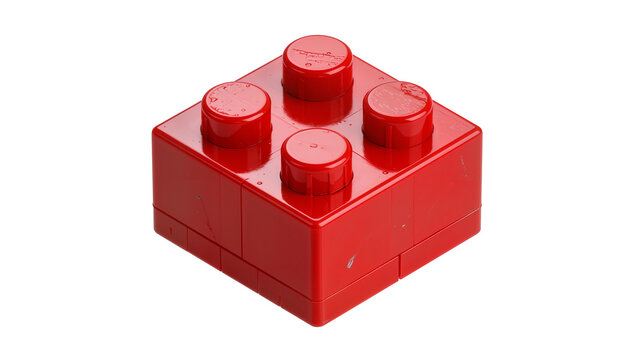 Red plastic building block with four studs, isolated on transparent background