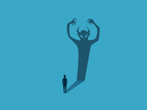 businessman with a demonic shadow within him