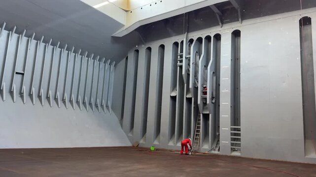 deckhands and dust at the empty cargo compartment of the ship.