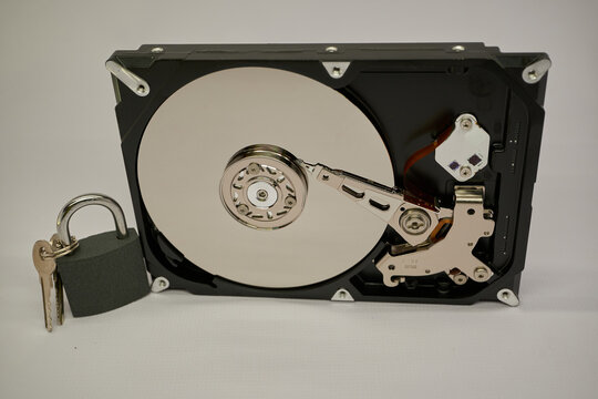 Open Hard Drive Disk with Padlock and Keys Data Security