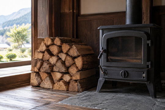 Split Firewood Beside a Wood Burning Stove