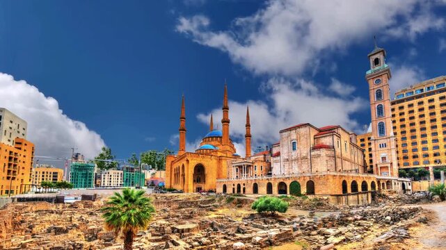 A view of the Saint George Maronite Cathedral and the Mohammad Al-Amin Mosque at the historic centre of Beirut, in Lebanon, down town. Ancient Roman, Hellenistic, Byzantine ruins on the foreground.