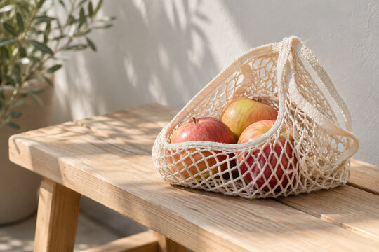 Cotton mesh produce bag with whole apples