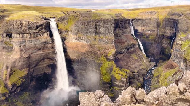 Majestic Aerial View of H&aacute;ifoss Waterfall and Canyon in Iceland