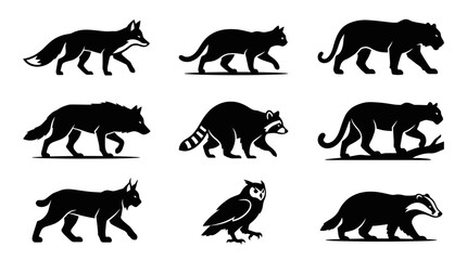 Fototapeta premium Black silhouettes of various wild animals.