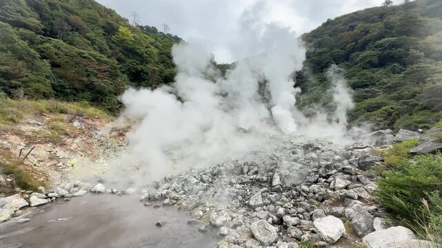 Steam rising from fumaroles at Hachiman Ojigoku, Kurinodake, Japan
