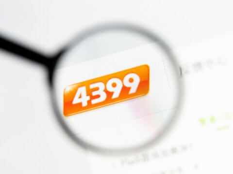 Milan, Italy 2026, 15 AGO Closeup of 4399 com website page on a laptop screen. Focus on 4399 com logo under a magnifying glass.