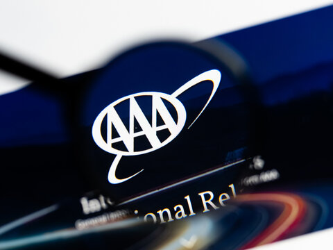 Milan, Italy 2026, 15 AGO Closeup of aaa com website page on a laptop screen. Focus on aaa com logo under a magnifying glass.