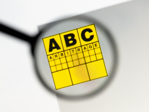 Milan, Italy 2026, 15 AGO Closeup of ABC Arbitrage website page on a laptop screen. Focus on ABC Arbitrage logo under a magnifying glass.