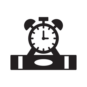 Alarm clock on book study time icon
