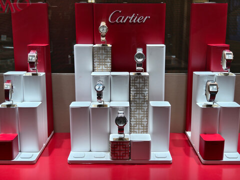 Shanghai, China-Jan.13th 2026: exquisite luxury watches displayed in a Cartier boutique window